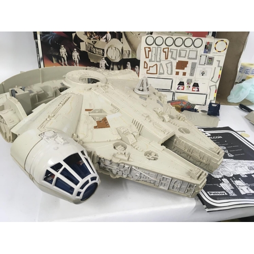 30 - A boxed vintage Star Wars Millenium Falcon with missing or broken parts. Includes instruction leafle... 