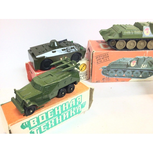 303 - 4 Boxed Russian Diecast Military Vehicles.