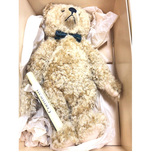 305 - A Boxed Steiff Henderson Bear With Certificate. Approx height 53CM.