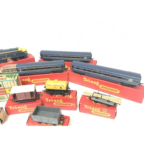 337 - A Collection of 00 Gauge Rolling Stock. Coaches and a Boxed Double Ended Diesel Loco #R.159.