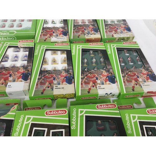 35 - A collection of 12 boxed Subbuteo football teams