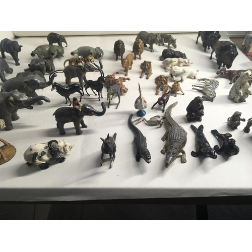 369 - A collection in excess of 50 metal animals by Britains etc