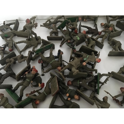 373 - A collection of approximately 100 plastic toy paratrooper soldiers by Crescent.