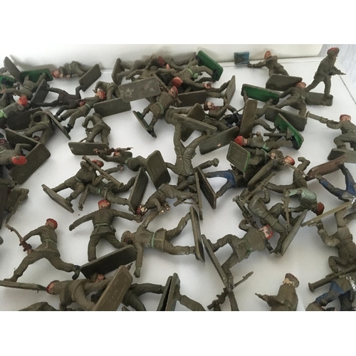 373 - A collection of approximately 100 plastic toy paratrooper soldiers by Crescent.