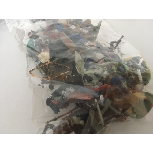 375 - A collection of 19 plastic mounted cowboys and Indians by Herald and Britains. Also includes 4 bags ... 