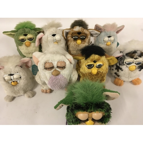 38 - A collection of 9 Furbys.