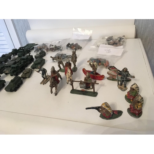 389 - A collection of metal soldiers by CRESCENT and other figures by TIMPO. Also included are various met... 