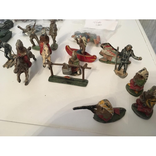 389 - A collection of metal soldiers by CRESCENT and other figures by TIMPO. Also included are various met... 