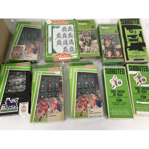 39 - A collection of 10 boxed Subbuteo football teams