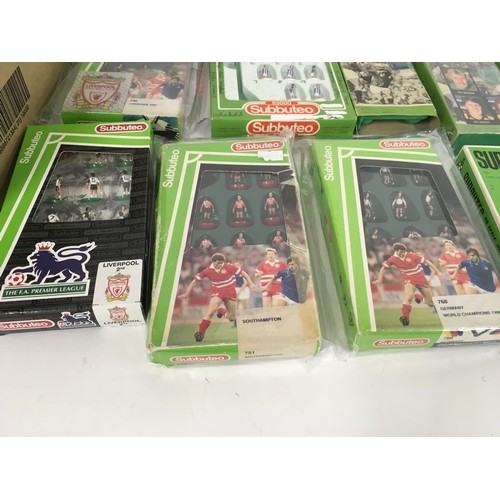 39 - A collection of 10 boxed Subbuteo football teams