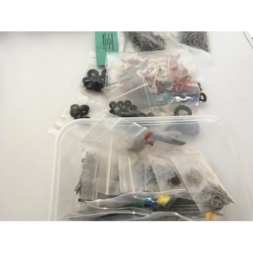 398 - 6 containers holding a large number of accessories for plastic and metal models