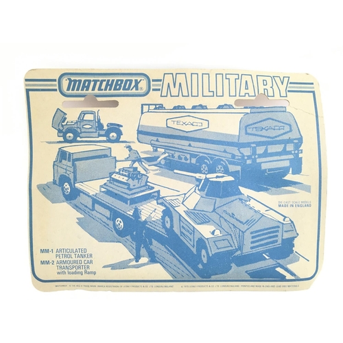 412 - A Carded And Sealed Matchbox MM-2 Armoured Car Transporter With Loading Ramp.