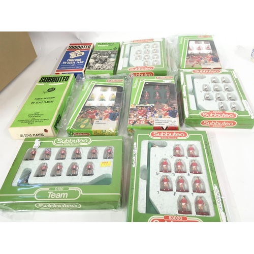 42 - A collection of 10 boxed Subbuteo football teams.