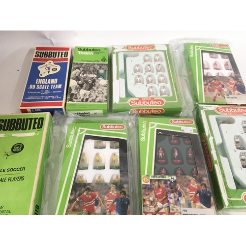 42 - A collection of 10 boxed Subbuteo football teams.