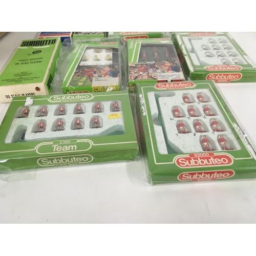 42 - A collection of 10 boxed Subbuteo football teams.