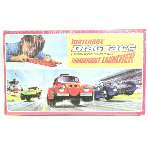 451 - A Boxed and Partly sealed Matchbox Drag Race Set G-6.