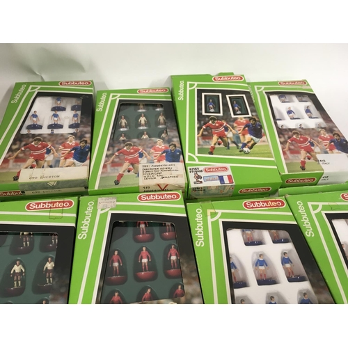 46 - A collection of 10 boxed Subbuteo football teams.