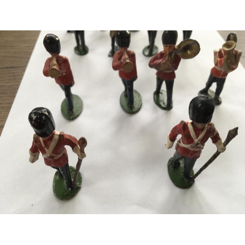 466 - A collection of metal soldiers comprising a band, possibly Britain and Wend Al. Consists of 14pieces... 