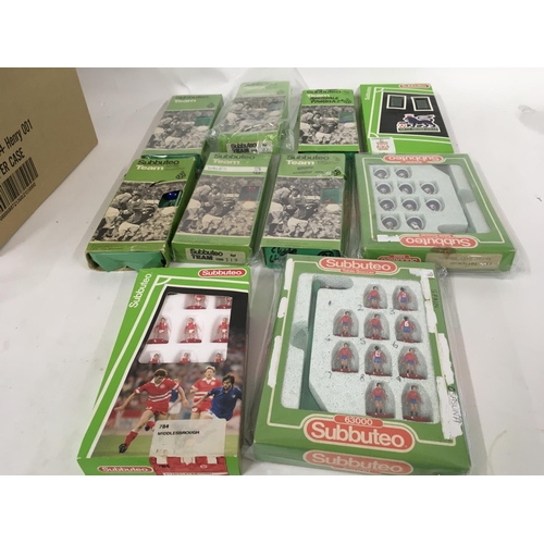 47 - A collection of 10 boxed Subbuteo football teams