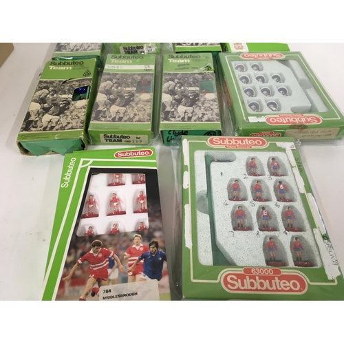 47 - A collection of 10 boxed Subbuteo football teams