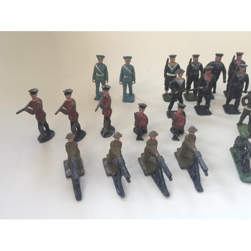 470 - A collection of thirty metal model soldiers and sailors by various manufacturers. Collection include... 