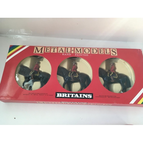 485 - Collection of 4 boxed Britains metal model soldiers