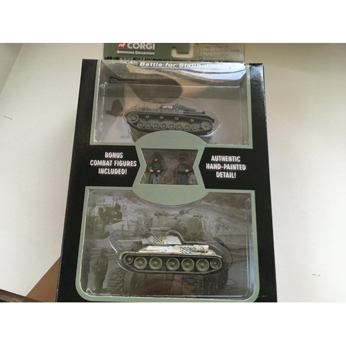 489 - A collection of diecast and plastic model vehicles and soldiers by Corgi ..Academy and 21st century ... 