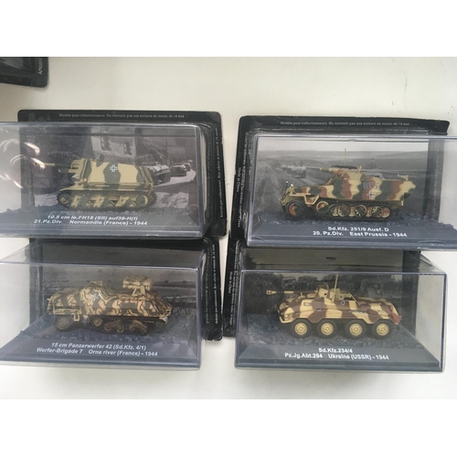 506 - A collection of boxed military vehicles from WW11. Each with the original packaging is mounted in a ... 