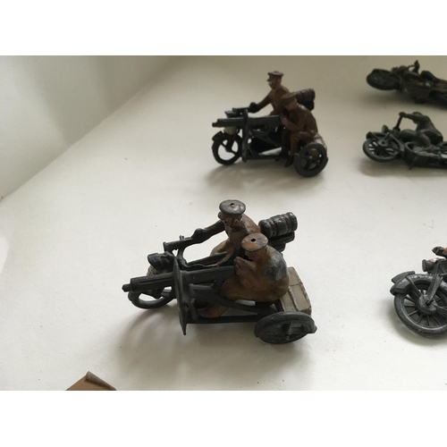 513 - A great collection of metal soldiers with motorcycles mainly by by Britains ..Johill Co. 10 pieces i... 