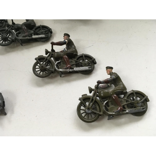 513 - A great collection of metal soldiers with motorcycles mainly by by Britains ..Johill Co. 10 pieces i... 