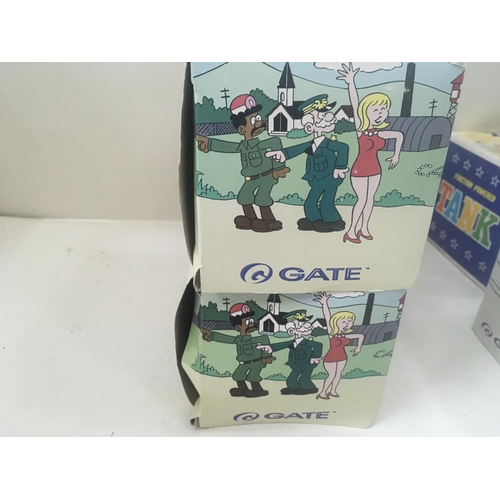 515 - A collection of four boxed toy vehicles comprising 3 jeeps by GATE 2x beetle Bailey and 1 Laurel and... 