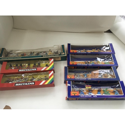 517 - A collection of 7 boxed action models, 3 by Britains 7256..7347..7794. Four boxes by Herald 4446..44... 