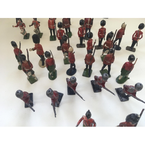 519 - A collection of 37 lead figures mainly by Britains. Themed as British soldiers including musicians a... 