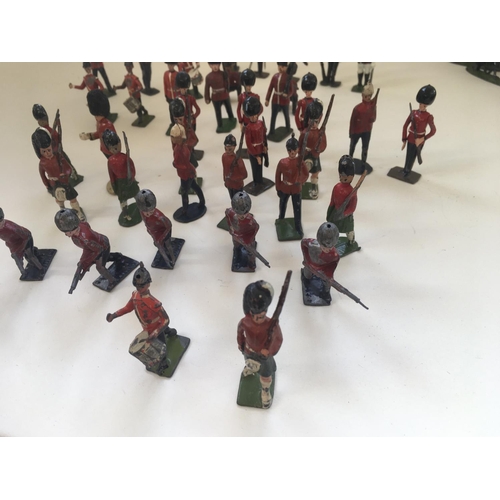 519 - A collection of 37 lead figures mainly by Britains. Themed as British soldiers including musicians a... 