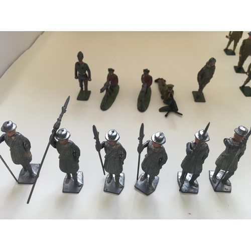 521 - A collection of 36 lead figures mainly Britains themes of military soldiers..airman..machine gunners... 