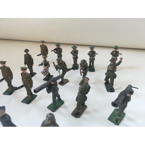 521 - A collection of 36 lead figures mainly Britains themes of military soldiers..airman..machine gunners... 