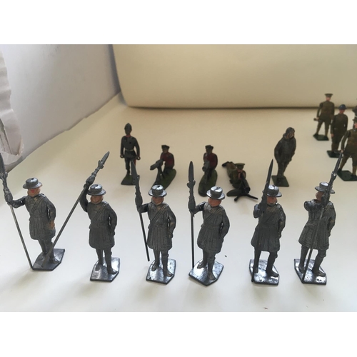 521 - A collection of 36 lead figures mainly Britains themes of military soldiers..airman..machine gunners... 