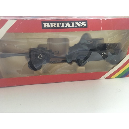 528 - A collection of 4 boxed metal military models by Britains. Includes 9783. 9724. 9784. 2026