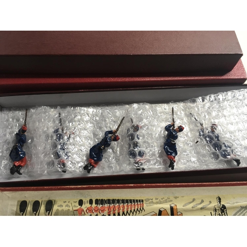 534 - A collection of four boxed metal soldier sets by Alymer..Charbens and 2 others.