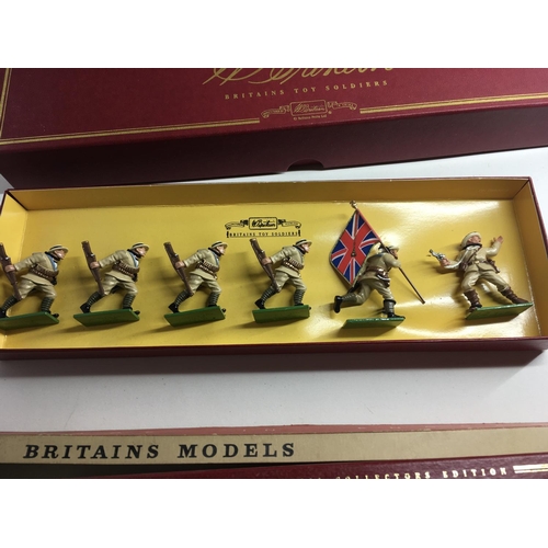 536 - A collection of four boxed metal figures by Britains consisting 00131. 8961. 1613. 1503