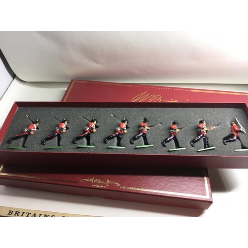 536 - A collection of four boxed metal figures by Britains consisting 00131. 8961. 1613. 1503