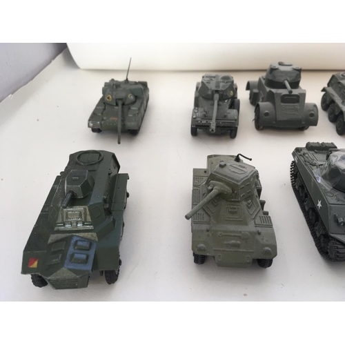 540 - A collection of 10 Playworn diecast metal military models. Made by Corgi. Dinky. Lone Star and other... 