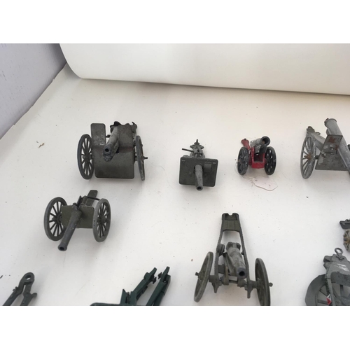 543 - A collection of 20 Playworn diecast military cannons from various ages. Both towable and mountable.