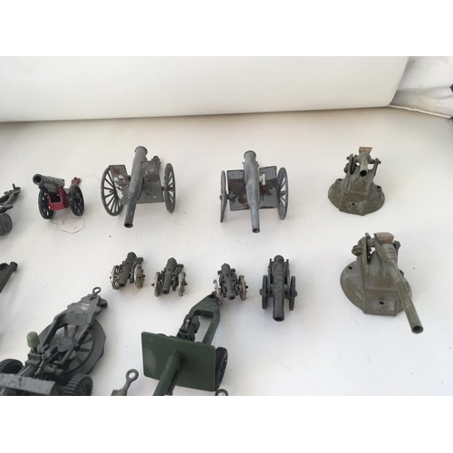 543 - A collection of 20 Playworn diecast military cannons from various ages. Both towable and mountable.