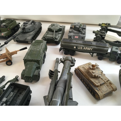 544 - A collection in excess of 25 pieces Playworn military models mainly by Dinky plus others.