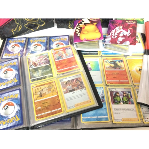 556 - A Collection of Modern PokÃ©mon Cards. With empty Binders.