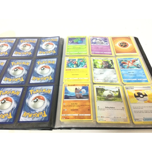 556 - A Collection of Modern PokÃ©mon Cards. With empty Binders.