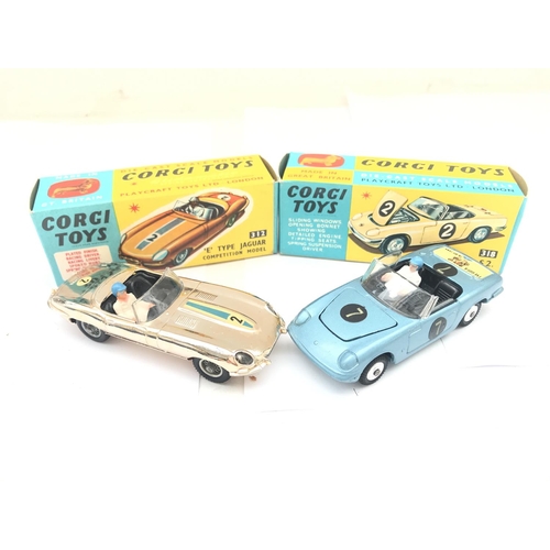 592 - A Boxed Corgi E Type Jaguar #312 and a Lotus Elan #318.