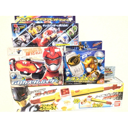 60 - A Collection of Japanese Power Rangers toys Boxed.