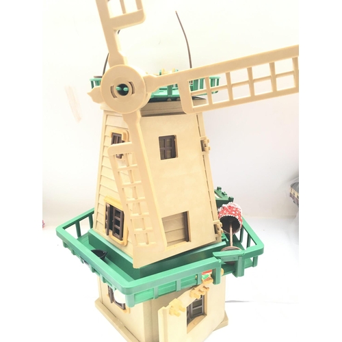 621 - 2 X Boxed Sylvanian Families figures and a Windmill. A/f.